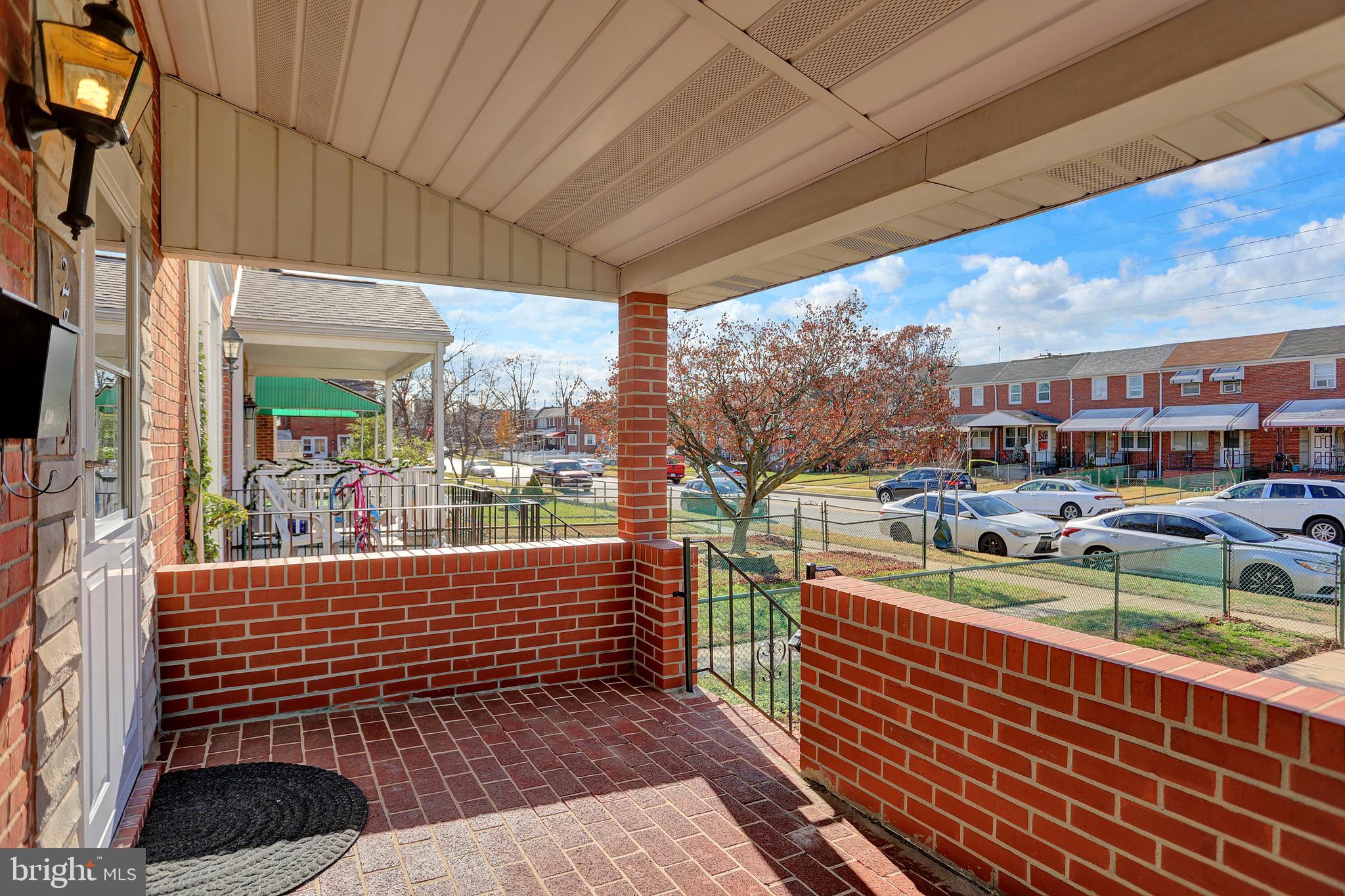 2857 Plainfield Road Baltimore, MD 21222 - Photo 32 of 38 a view of a balcony with chairs