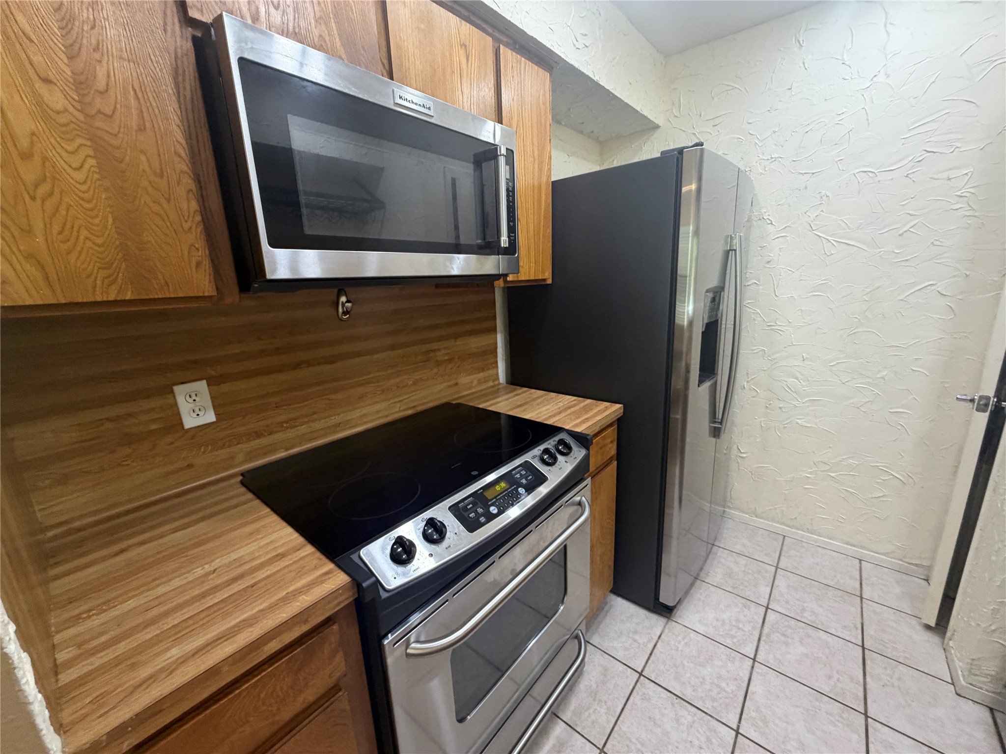 3744 Valley View Road, Unit C Austin, TX 78704 - Photo 9 of 25 a stove top oven sitting inside of a kitchen