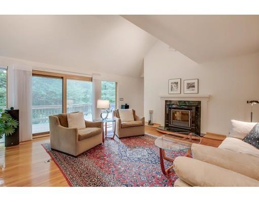 220 Old Littleton Road Harvard, MA 01451 - Photo 18 of 42 a living room with furniture and a fireplace
