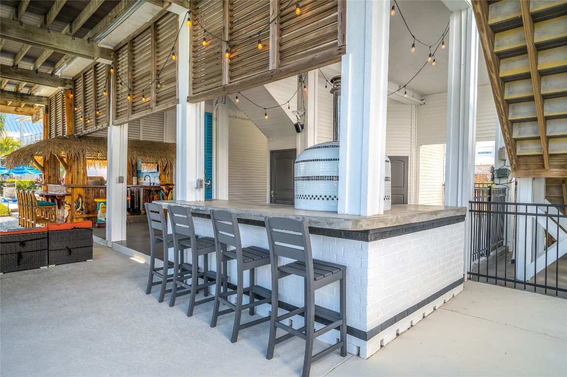 242 Isles End Road Tiki Island, TX 77554 - Photo 45 of 50 Another view of the pizza oven and pull up seating.