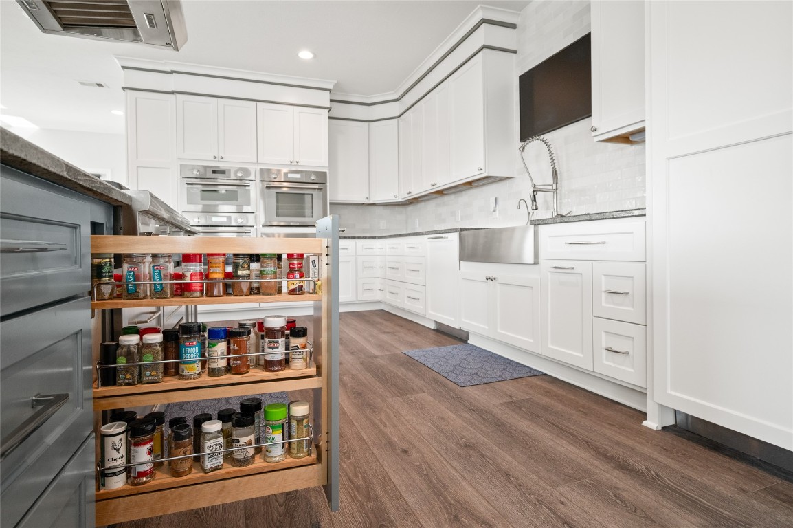 242 Isles End Road Tiki Island, TX 77554 - Photo 6 of 50
This spice rack is the perfect example of genius utilization of space.