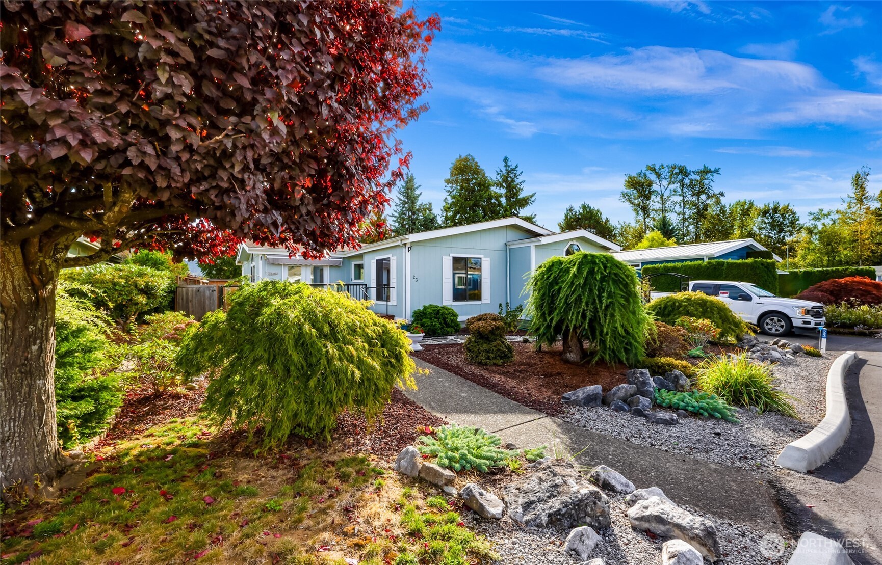 3802 James Street, Unit 23 Bellingham, WA 98226 - Photo 1 of 34 a house with lots of trees