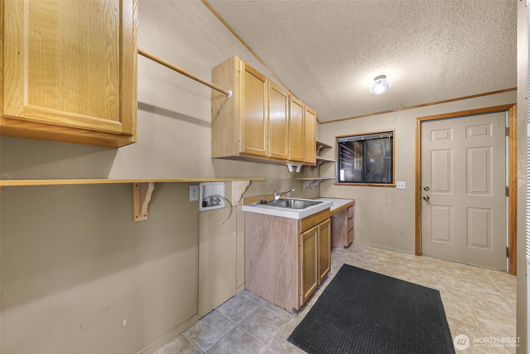 3802 James Street, Unit 23 Bellingham, WA 98226 - Photo 21 of 34 a kitchen with a sink a stove and refrigerator