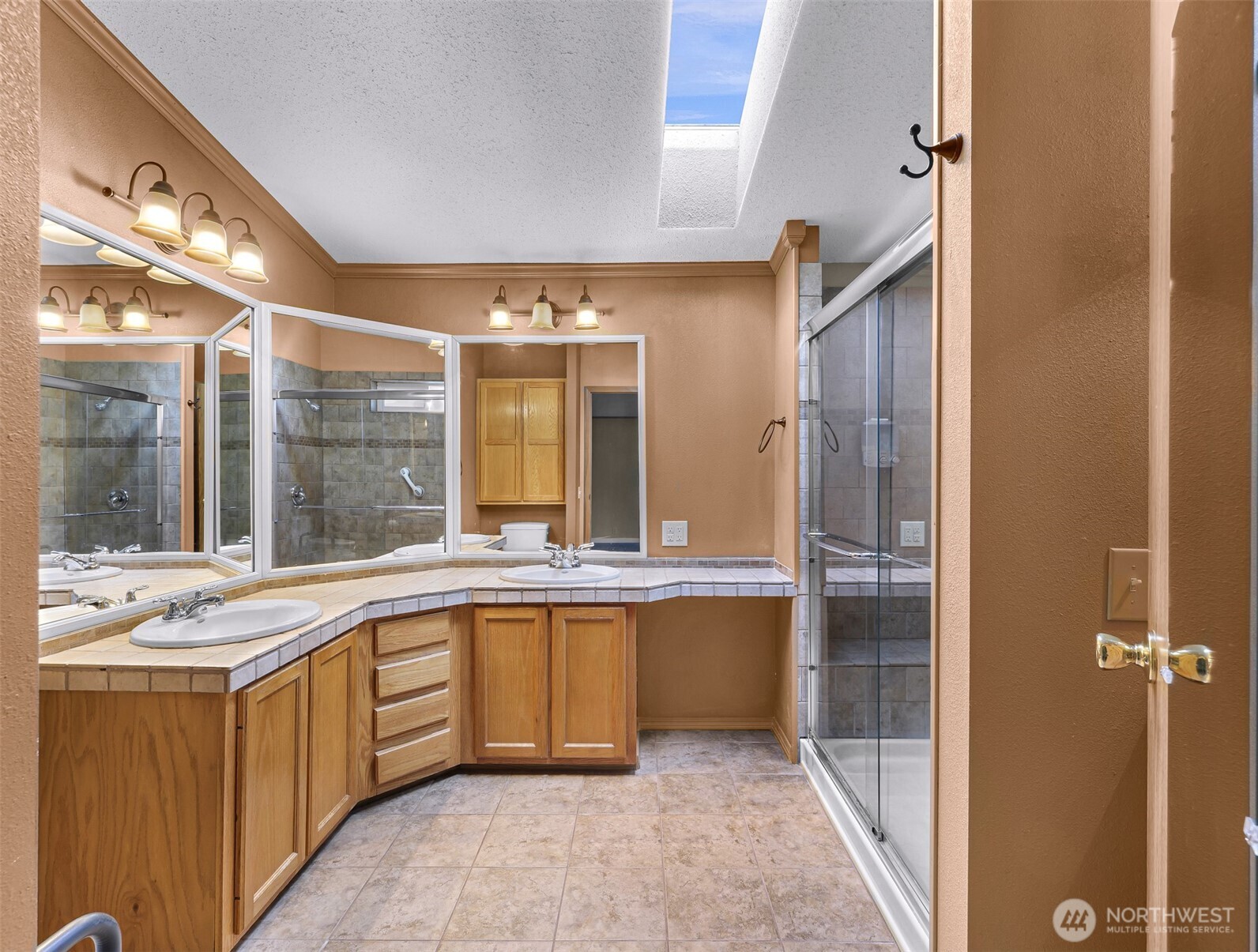 3802 James Street, Unit 23 Bellingham, WA 98226 - Photo 22 of 34 a large kitchen with a sink and cabinets