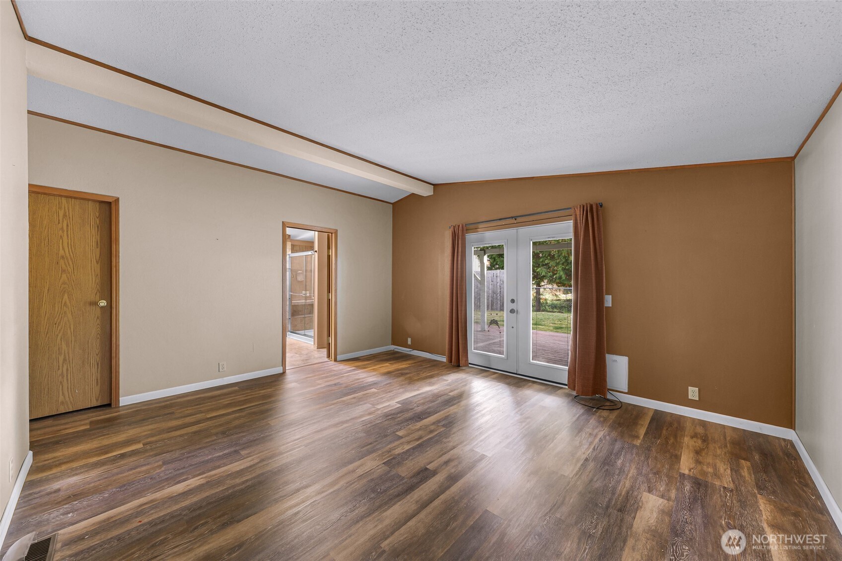 3802 James Street, Unit 23 Bellingham, WA 98226 - Photo 26 of 34 a view of an empty room with wooden floor and closet