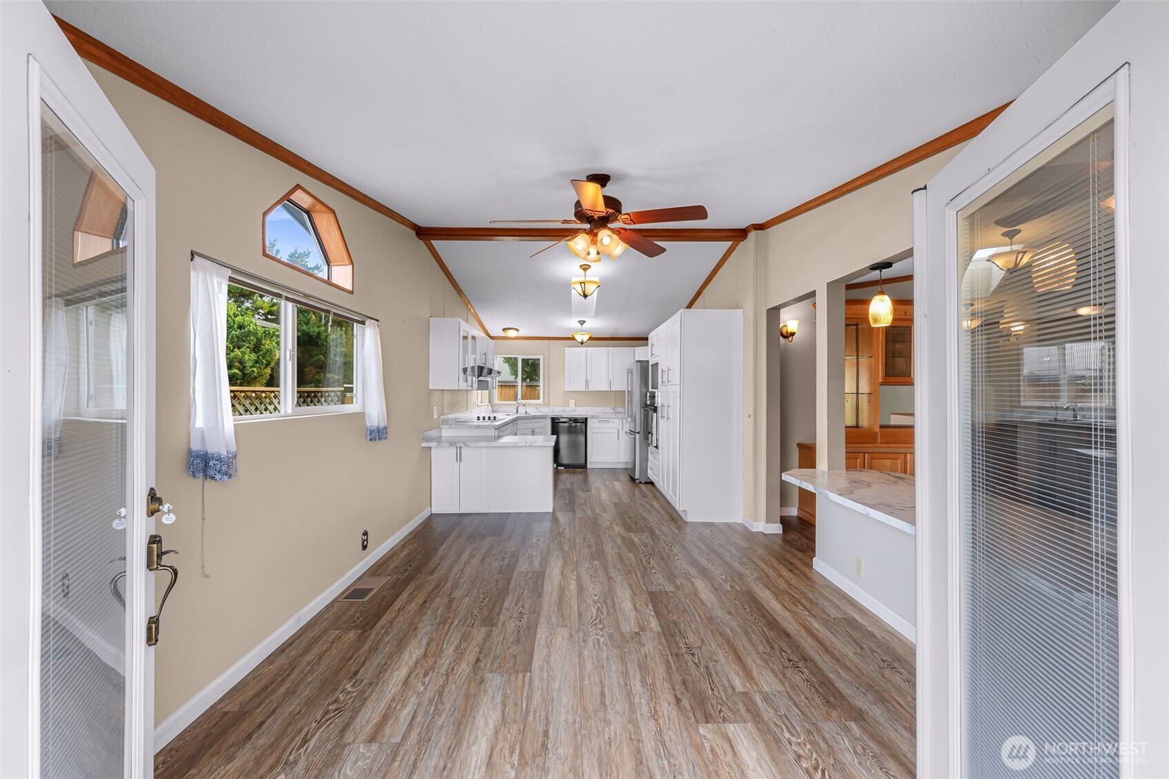 3802 James Street, Unit 23 Bellingham, WA 98226 - Photo 3 of 34 a view of a hallway with wooden floor and staircase