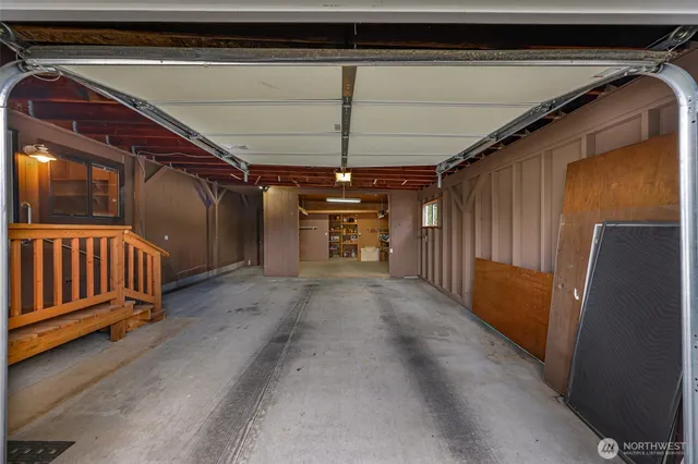 a view of hallway with furniture
