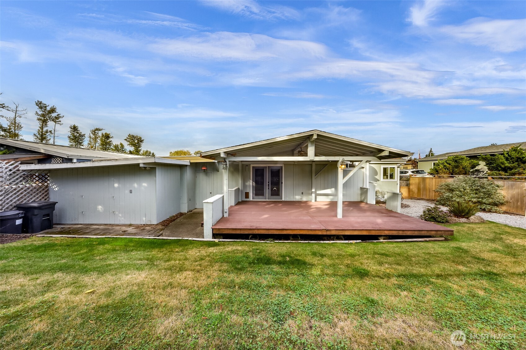 3802 James Street, Unit 23 Bellingham, WA 98226 - Photo 33 of 34 a front view of house with yard and trees in the background