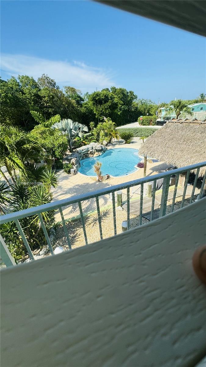 443 4th Road, Unit MAIN Key Largo, FL 33037 - Photo 22 of 31 a view of swimming pool with outdoor seating