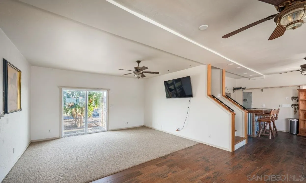 31141 Saddleback Road Valley Center, CA 92082 - Photo 4 of 23 a view of a livingroom with furniture and windows