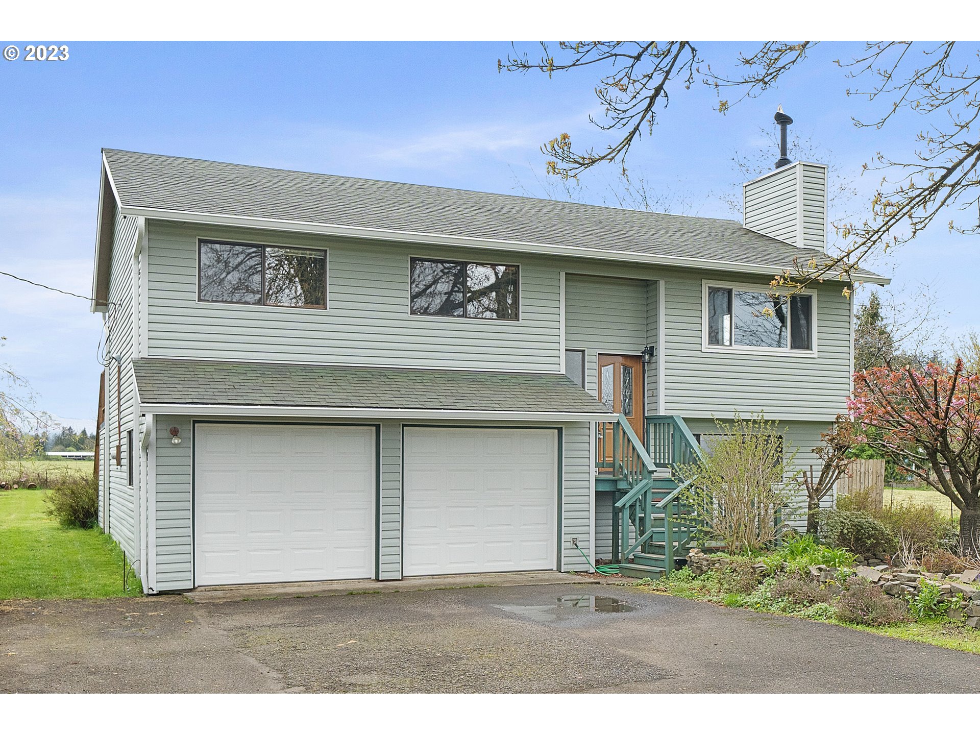 a view of a front of house with a garage