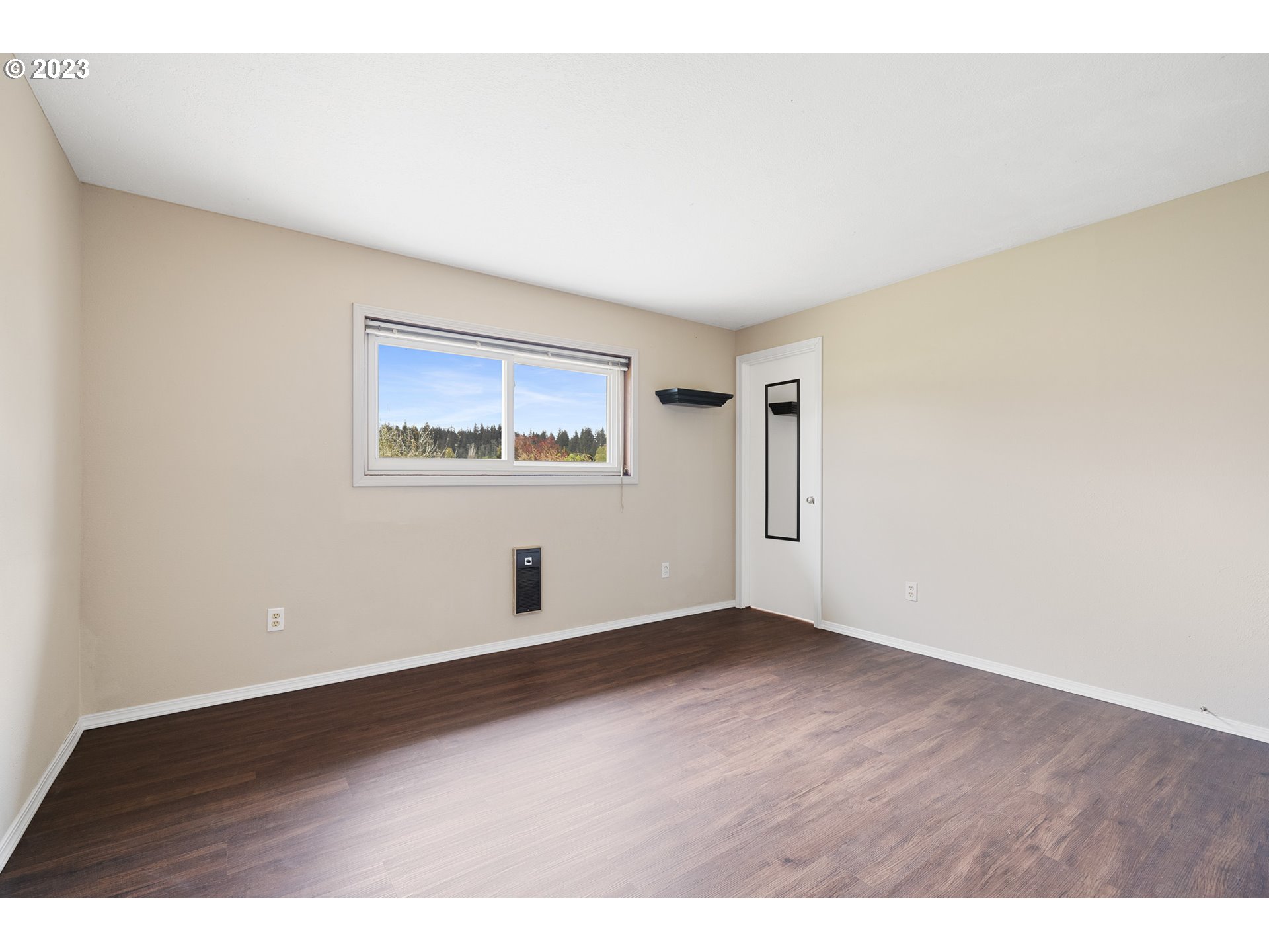 8025 Long Prairie Road Tillamook, OR 97141 - Photo 23 of 41 a view of an empty room with a window