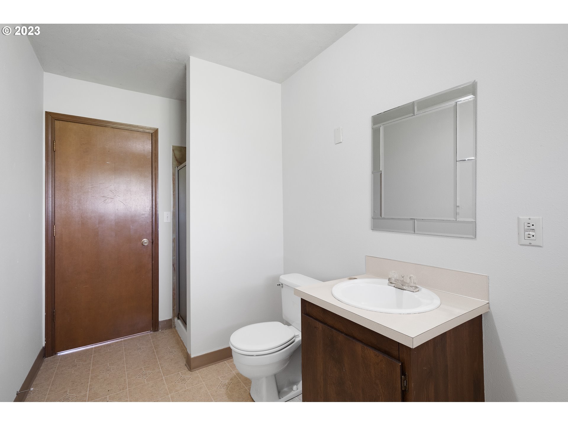 8025 Long Prairie Road Tillamook, OR 97141 - Photo 28 of 41 a bathroom with a sink toilet and vanity