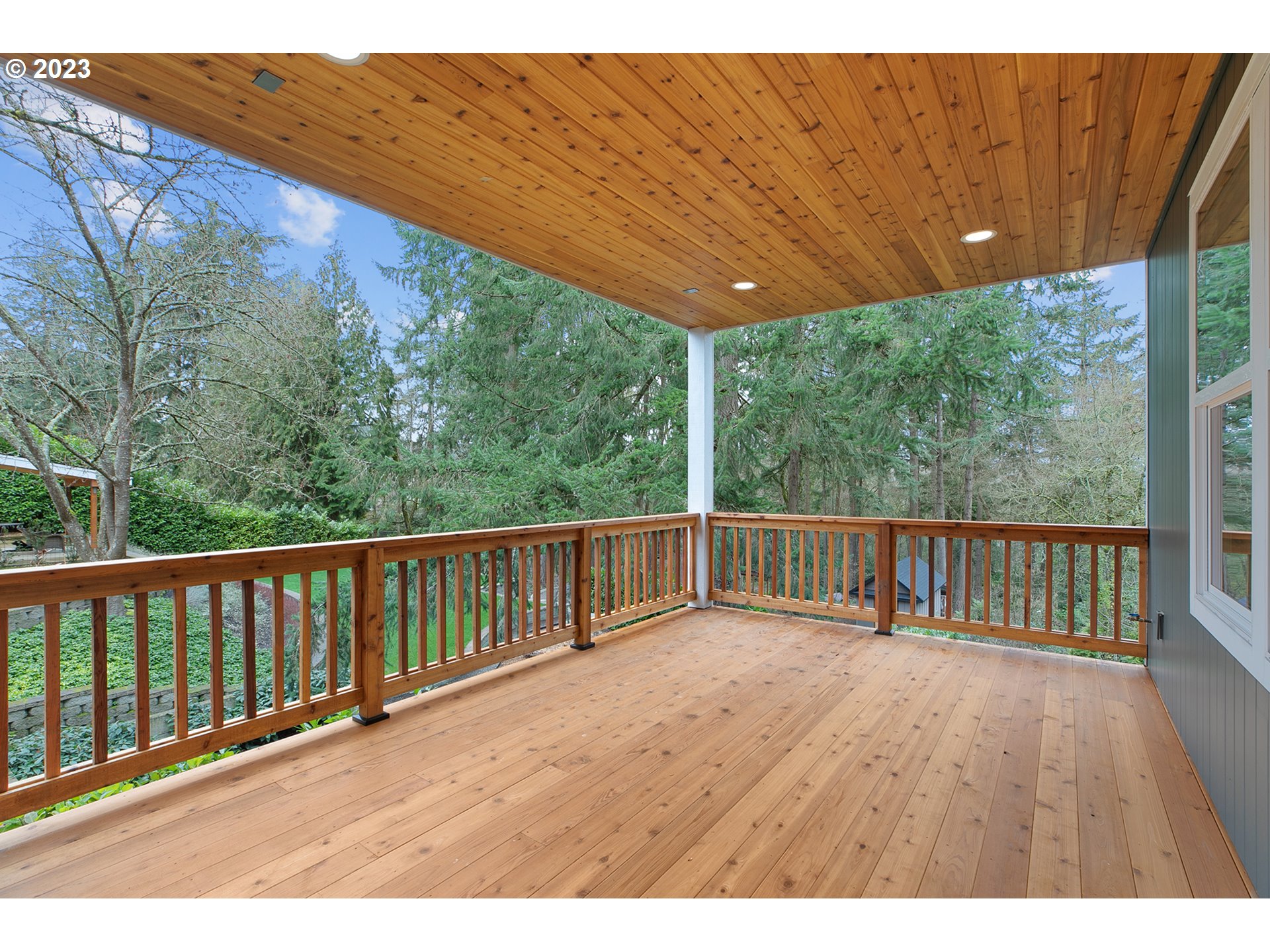 8651 Southwest 42nd Avenue Portland, OR 97219 - Photo 12 of 30 a balcony with wooden floor and outdoor space