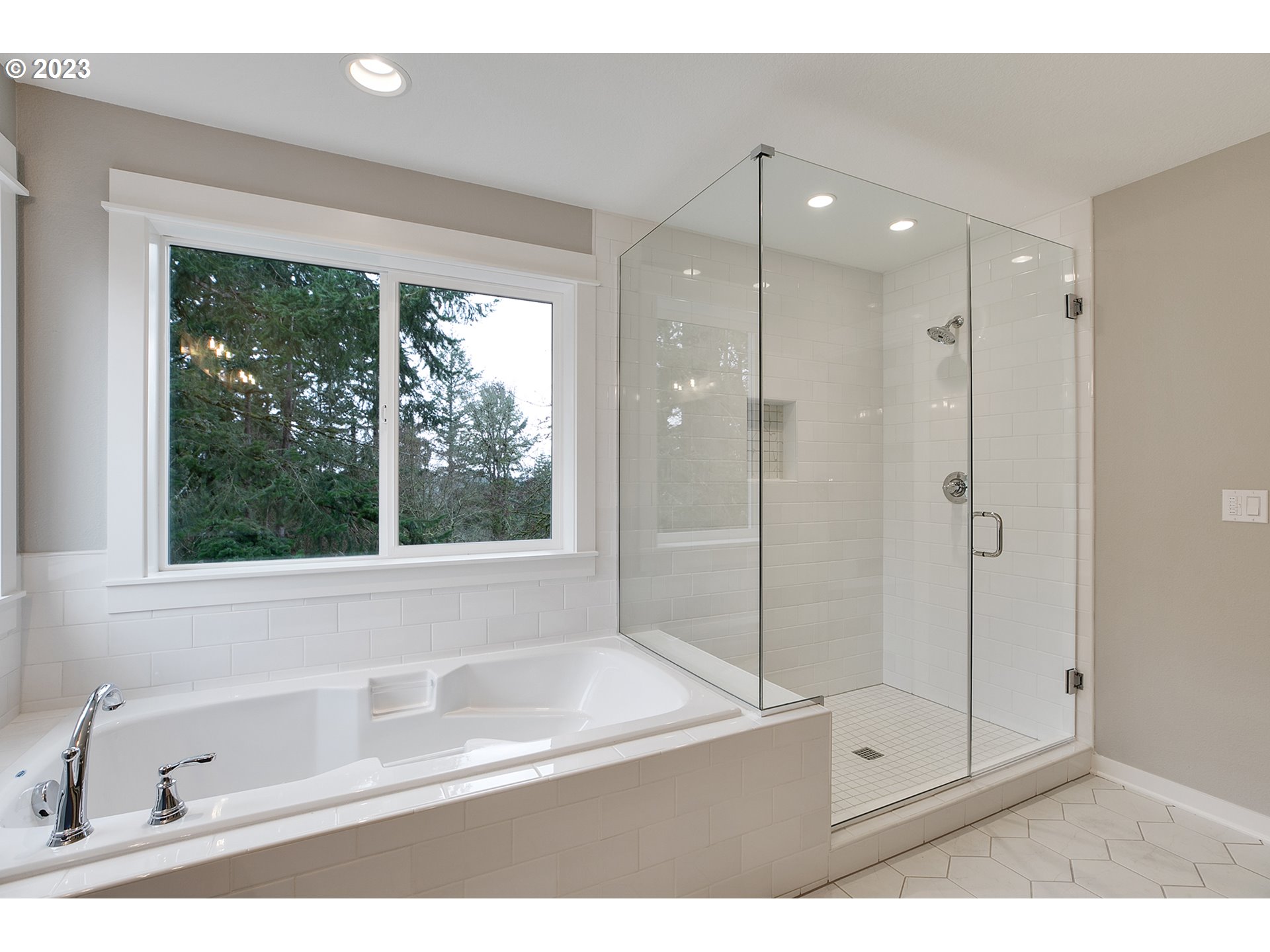 8651 Southwest 42nd Avenue Portland, OR 97219 - Photo 19 of 30 a bathroom with a tub shower and sink