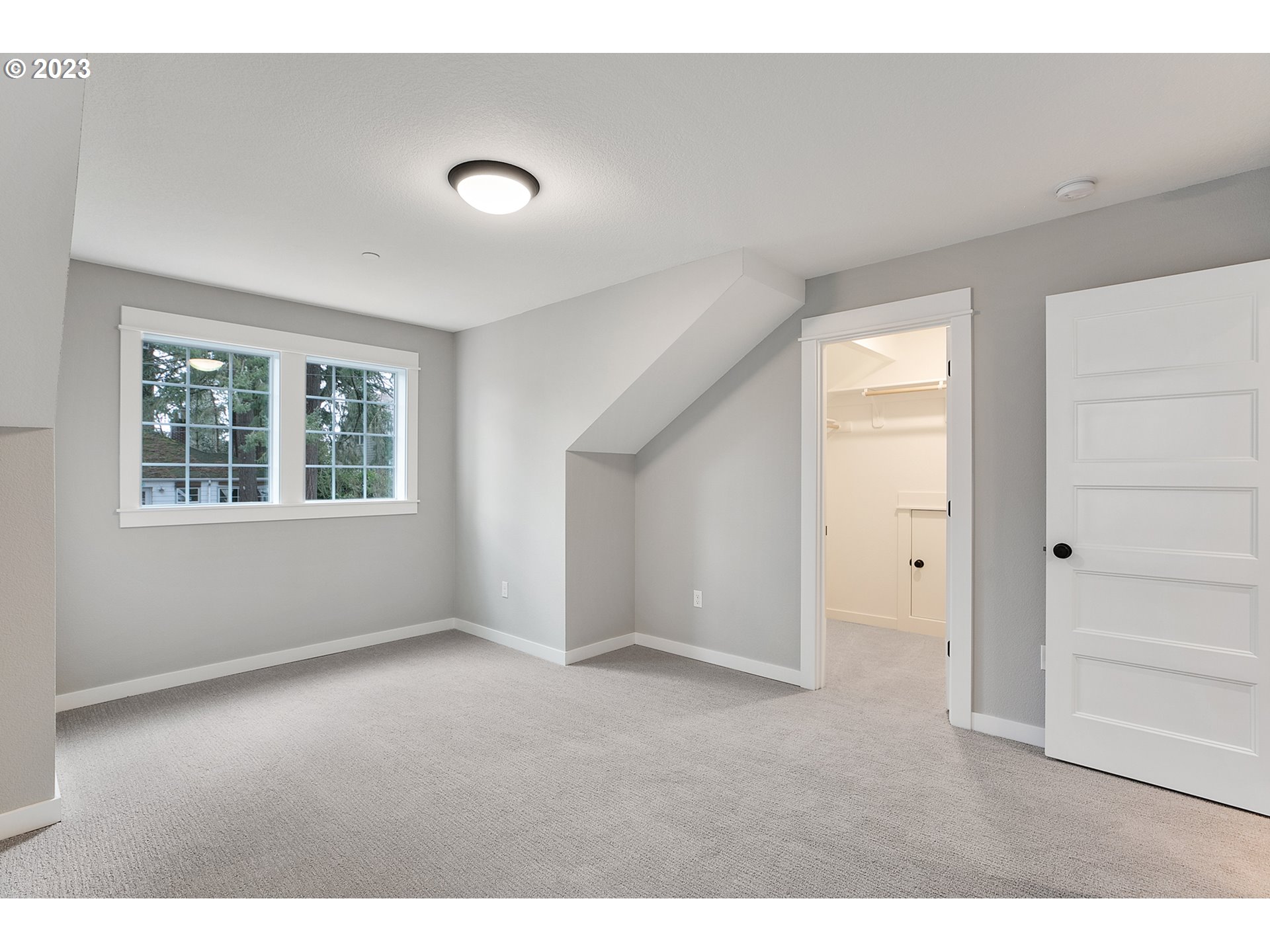 8651 Southwest 42nd Avenue Portland, OR 97219 - Photo 22 of 30 a view of an empty room with a window