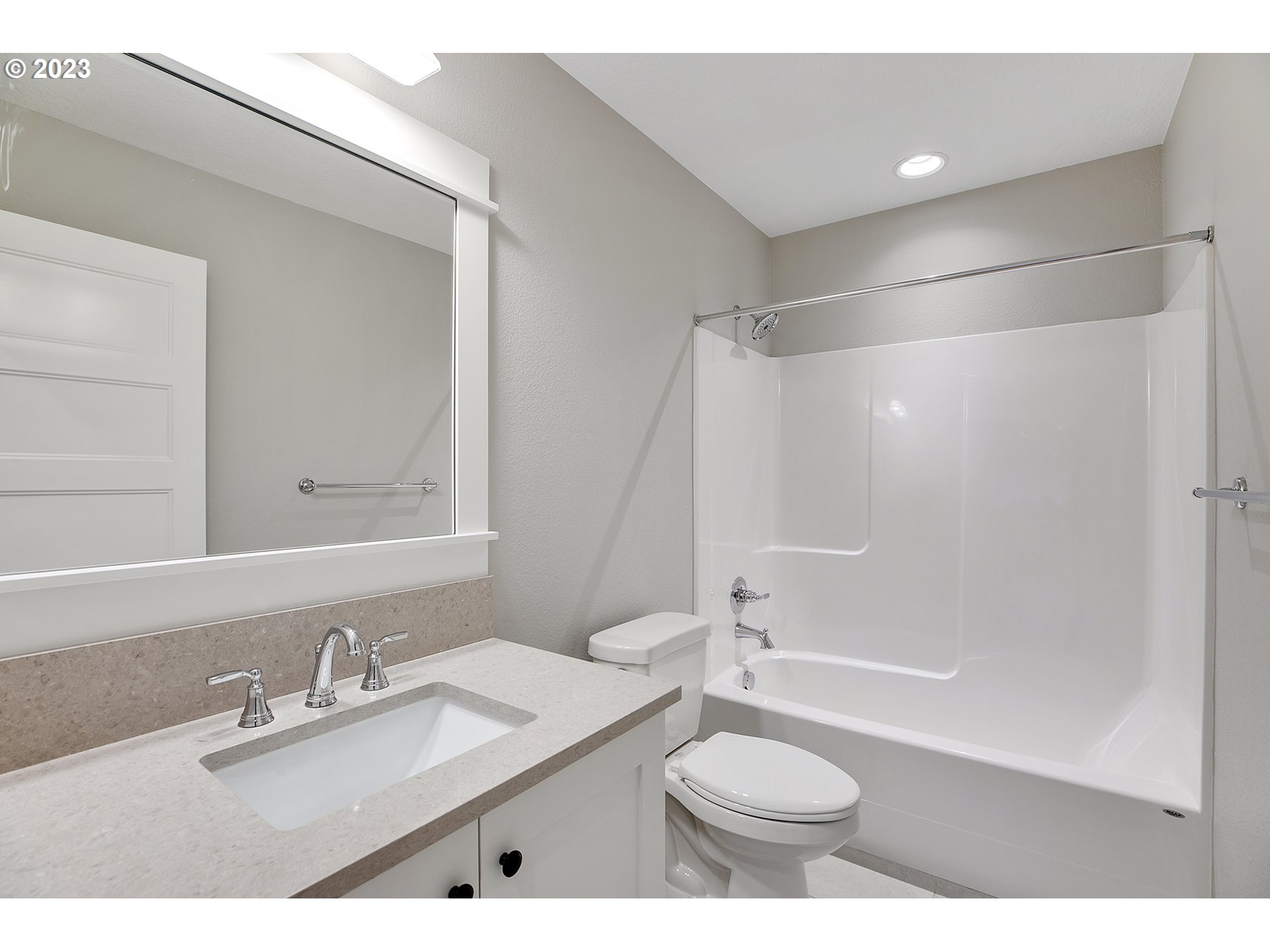 8651 Southwest 42nd Avenue Portland, OR 97219 - Photo 24 of 30 a bathroom with a sink a toilet and a mirror