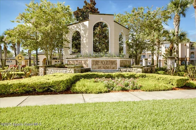 a house view with swimming pool