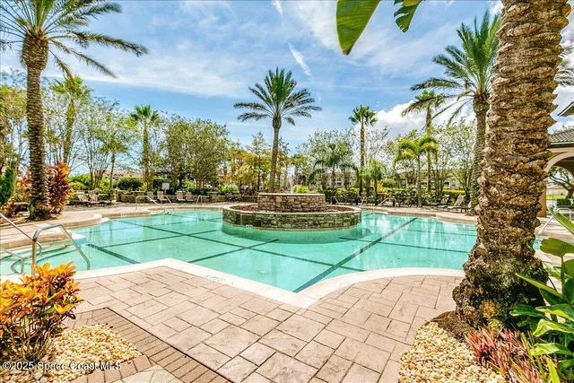 a view of a park with plants and trees