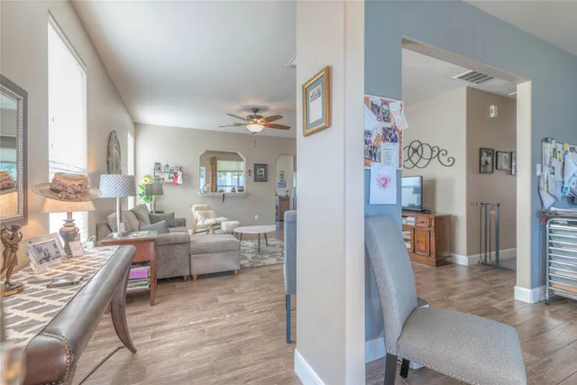 a living room with furniture and a table