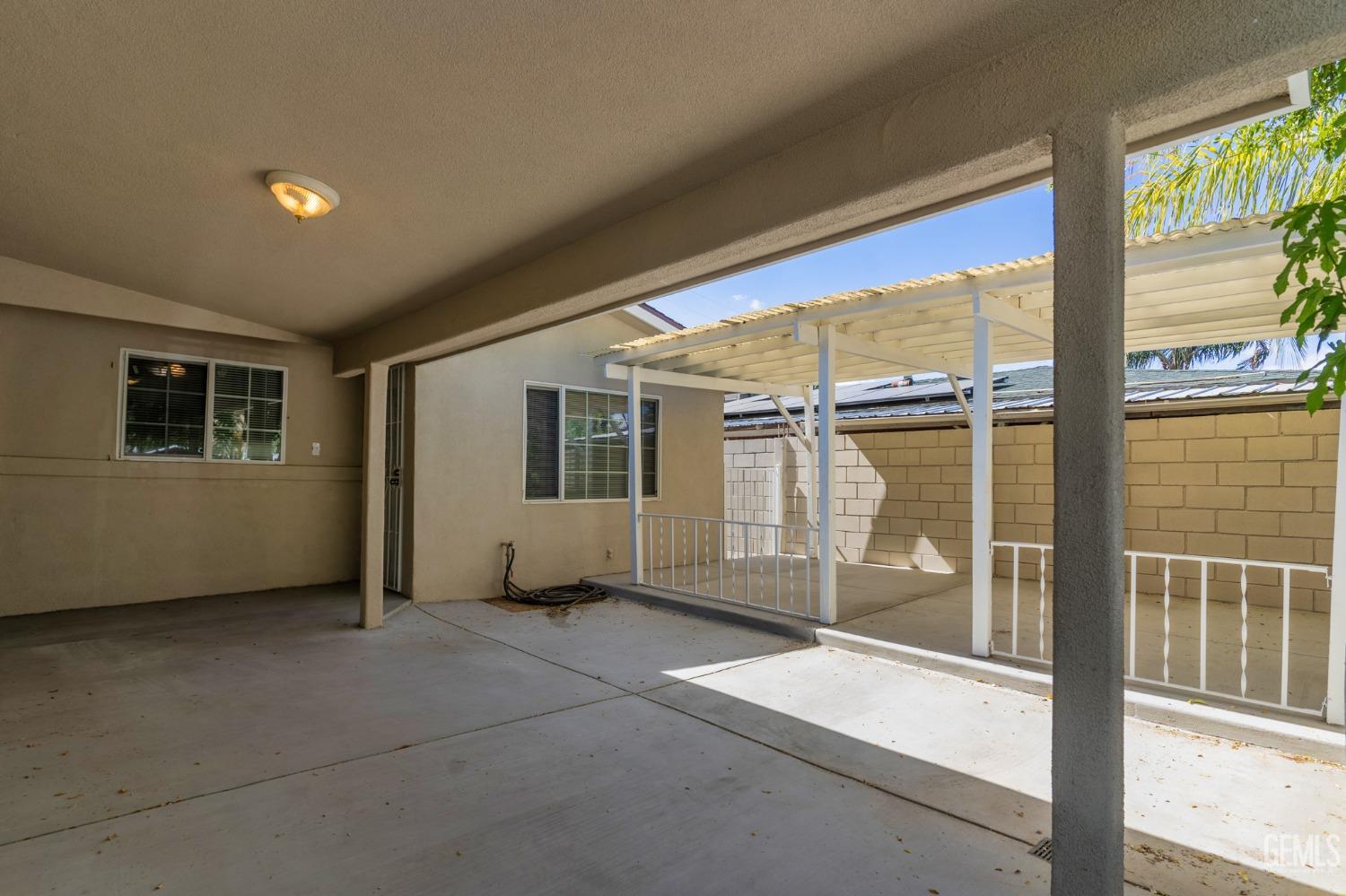 Undisclosed Address Bakersfield, CA 93305 - Photo 20 of 21 a view of an empty room with a window