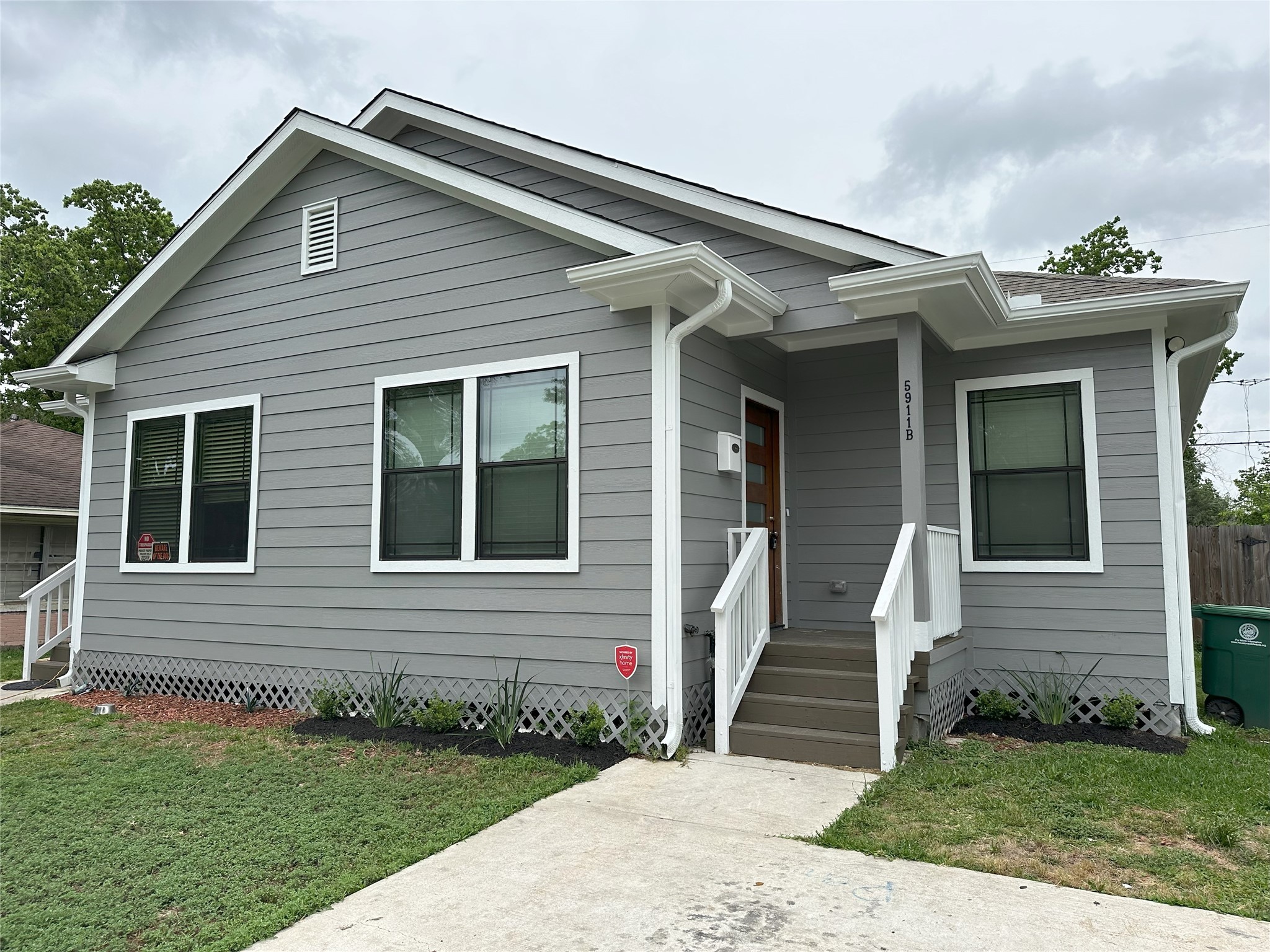 5911 Westover Street Houston, TX 77033 - Photo 21 of 21 a front view of a house with a yard