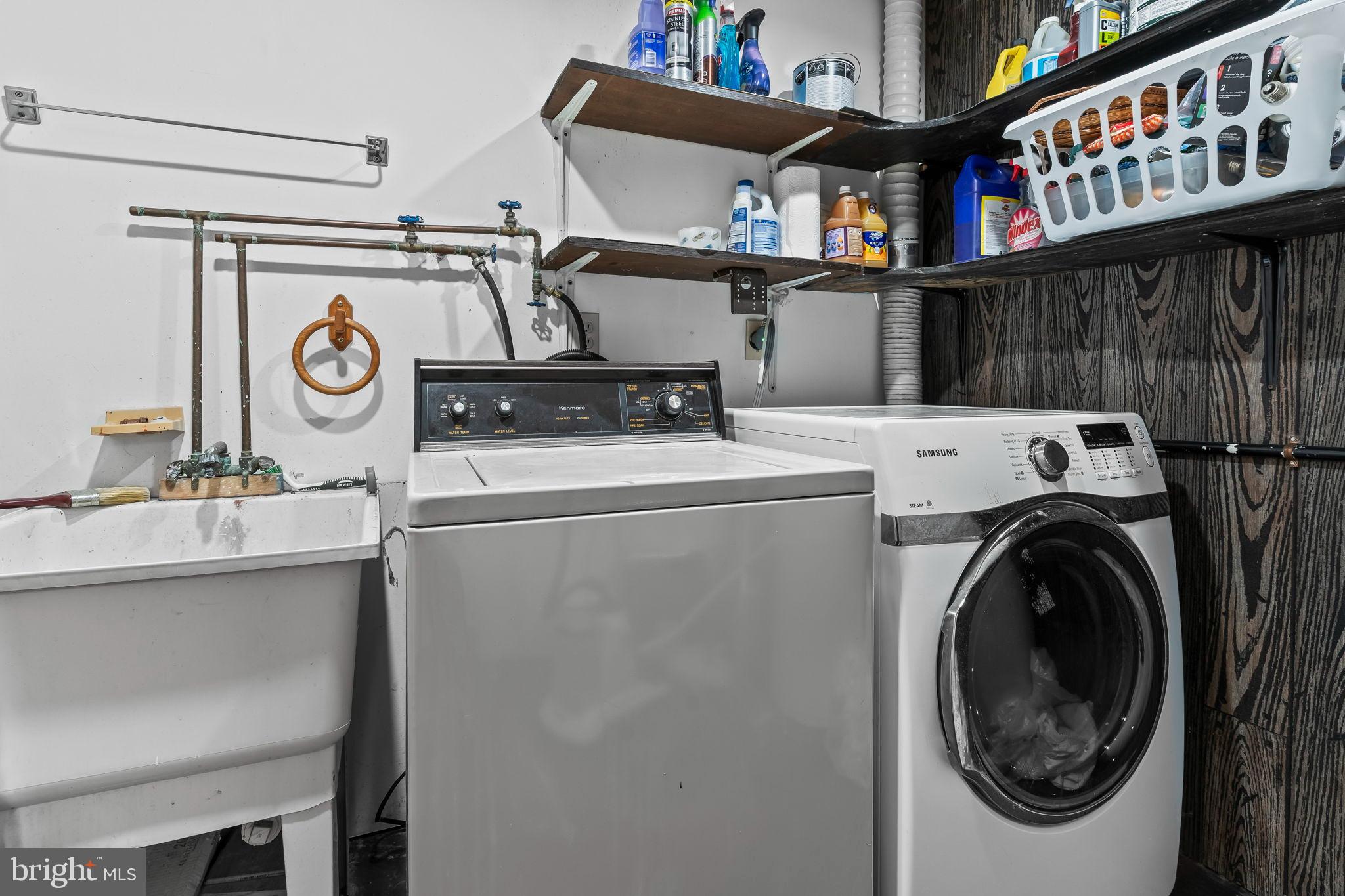 285 Red Cloud Road Lusby, MD 20657 - Photo 19 of 39 Modern laundry space with efficient storage.