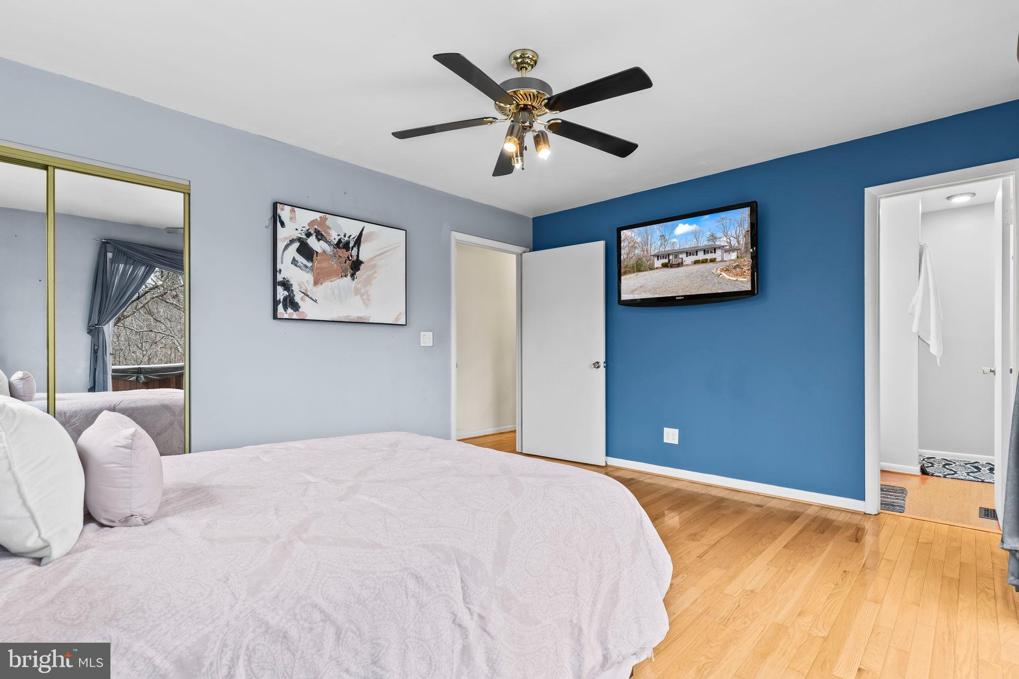 285 Red Cloud Road Lusby, MD 20657 - Photo 7 of 39 Serene bedroom with modern accents.