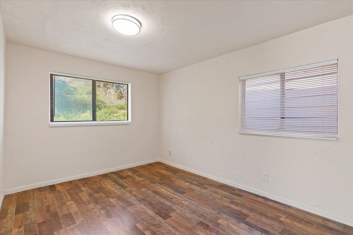 2108 Taylor Road Bethel Island, CA 94511 - Photo 17 of 31 a view of empty room with wooden floor and fan