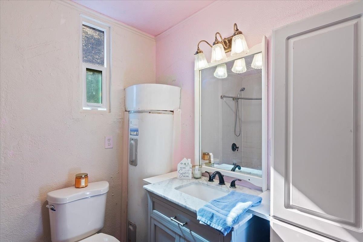 2108 Taylor Road Bethel Island, CA 94511 - Photo 18 of 31 a bathroom with a sink vanity granite and toilet