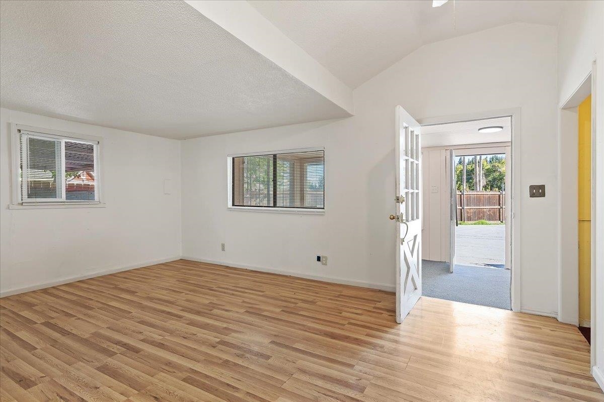 2108 Taylor Road Bethel Island, CA 94511 - Photo 8 of 31 a view of empty room with wooden floor and windows