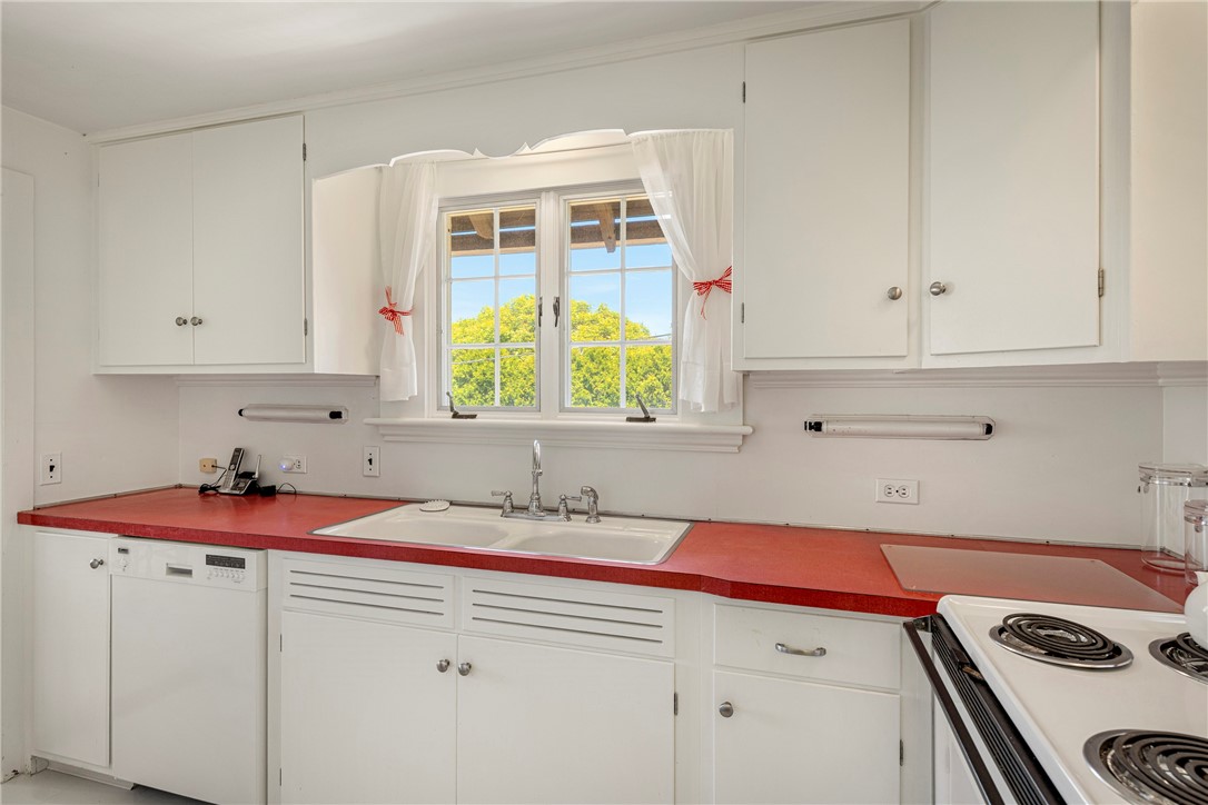 6 Chapel Lane Westerly, RI 02891 - Photo 19 of 24 A cottage kitchen completes the first floor