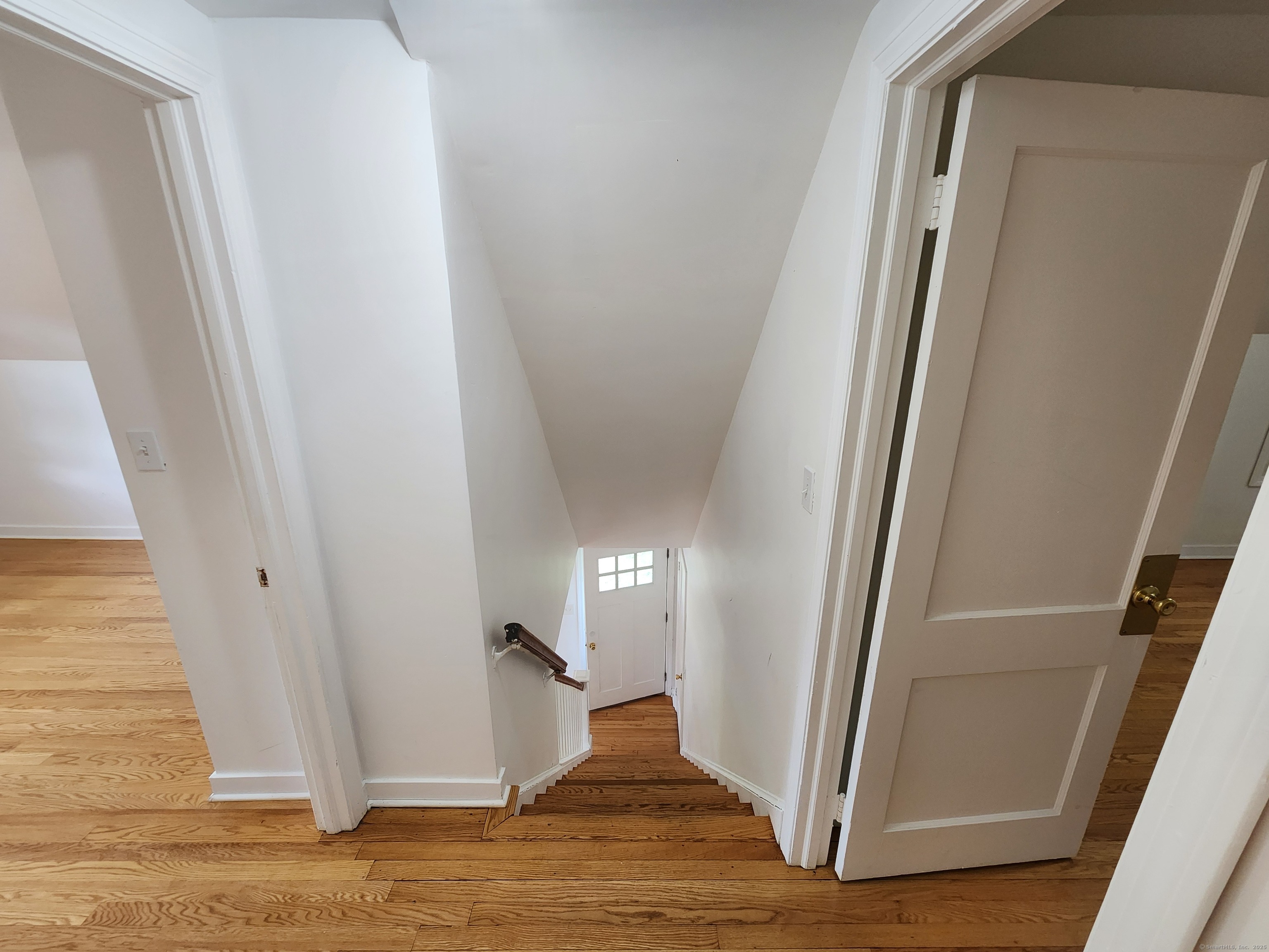 79 Honor Road West Haven, CT 06516 - Photo 17 of 36 a view of entryway with wooden floor