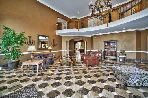 9381 Falling Waters Drive West Burr Ridge, IL 60527 - Photo 3 of 15 a living room with lots of furniture and flowers