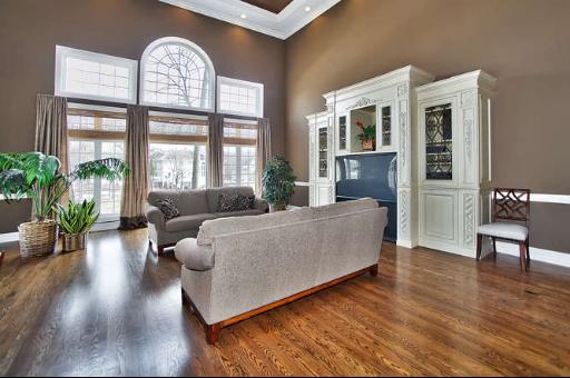 9381 Falling Waters Drive West Burr Ridge, IL 60527 - Photo 4 of 15 a living room with furniture large window and wooden floor