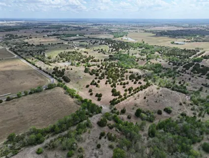 an aerial view of mountain with beach