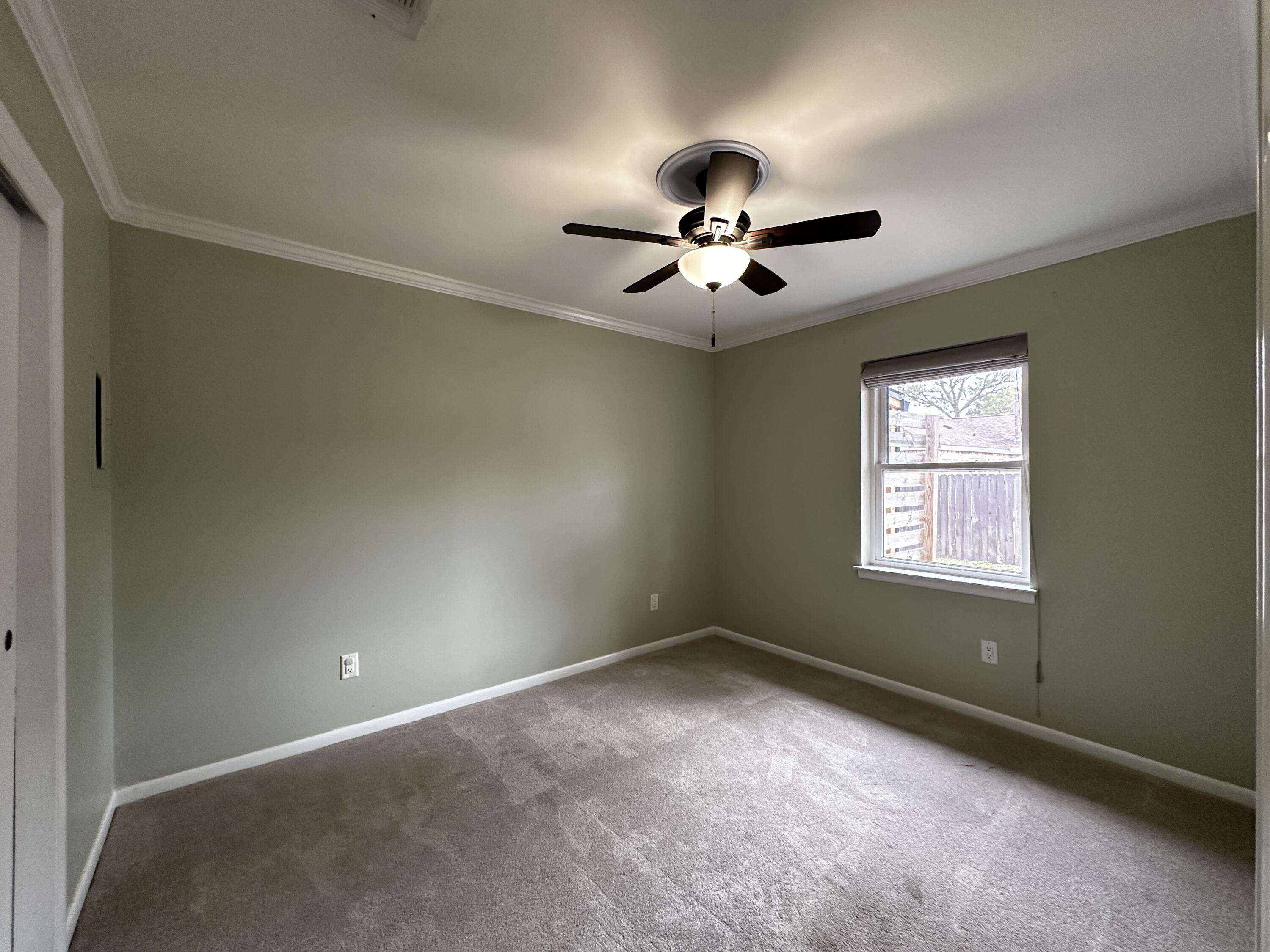 520 Justin Street Fort Walton Beach, FL 32547 - Photo 10 of 19 a view of an empty room with a window