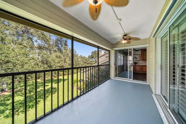 a view of hallway with furniture