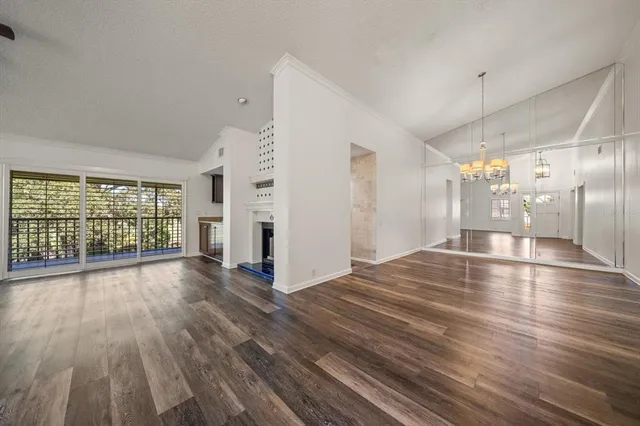 a view of a livingroom with wooden floor
