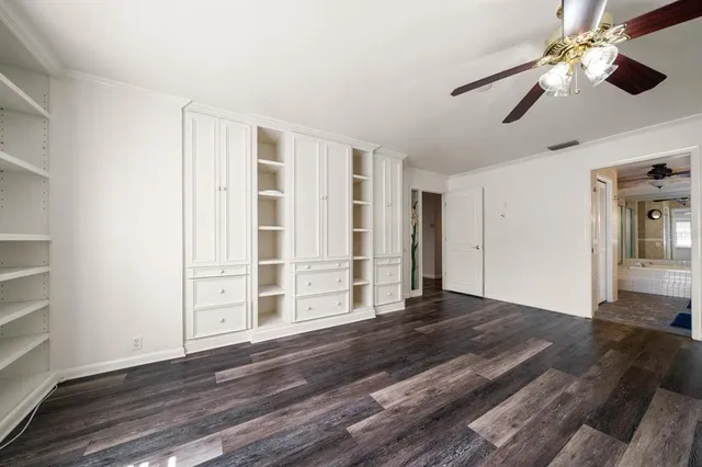 a view of a livingroom with wooden floor