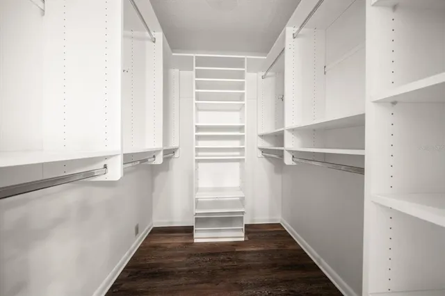 a view of an empty walk in closet