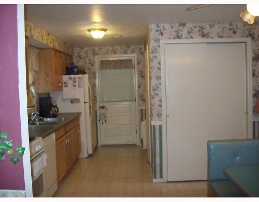 867 Blue Ridge Drive Plum, PA 15239 - Photo 6 of 13 Kitchen. KITCHEN BREAKFAST NOOK AND PANTRY WITH SIDE DOOR GOING TO ENCLOSED SUNPORCH.