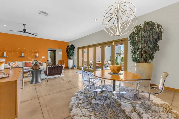 a kitchen with a stove a sink and a refrigerator