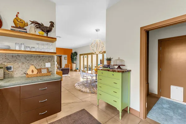 a bedroom with a bed and ceiling fan