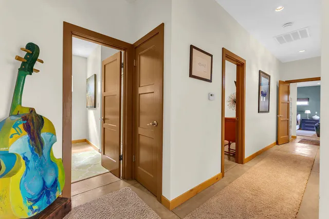 a bathroom with a sink vanity and a mirror