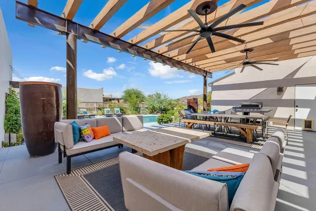 a view of a house with a backyard