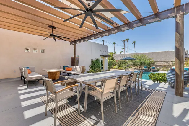 a potted plant sitting in front of a house