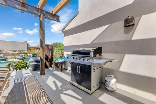 a view of a balcony with chairs
