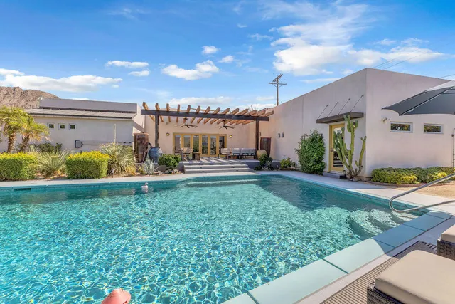 a view of a backyard of a house