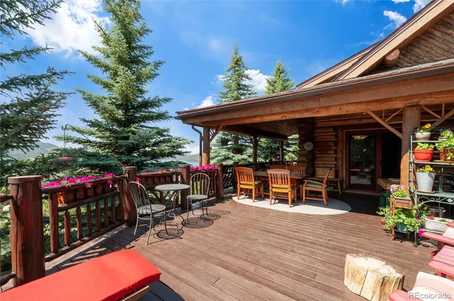 a view of a chairs and tables in the balcony